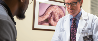 A doctor explaining colonoscopy biopsy results to a patient