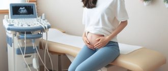 A female patient entering a gynecologist's office where ultrasound equipment for pelvic examinations can be seen.